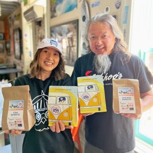 Amy and Wing holding coffee